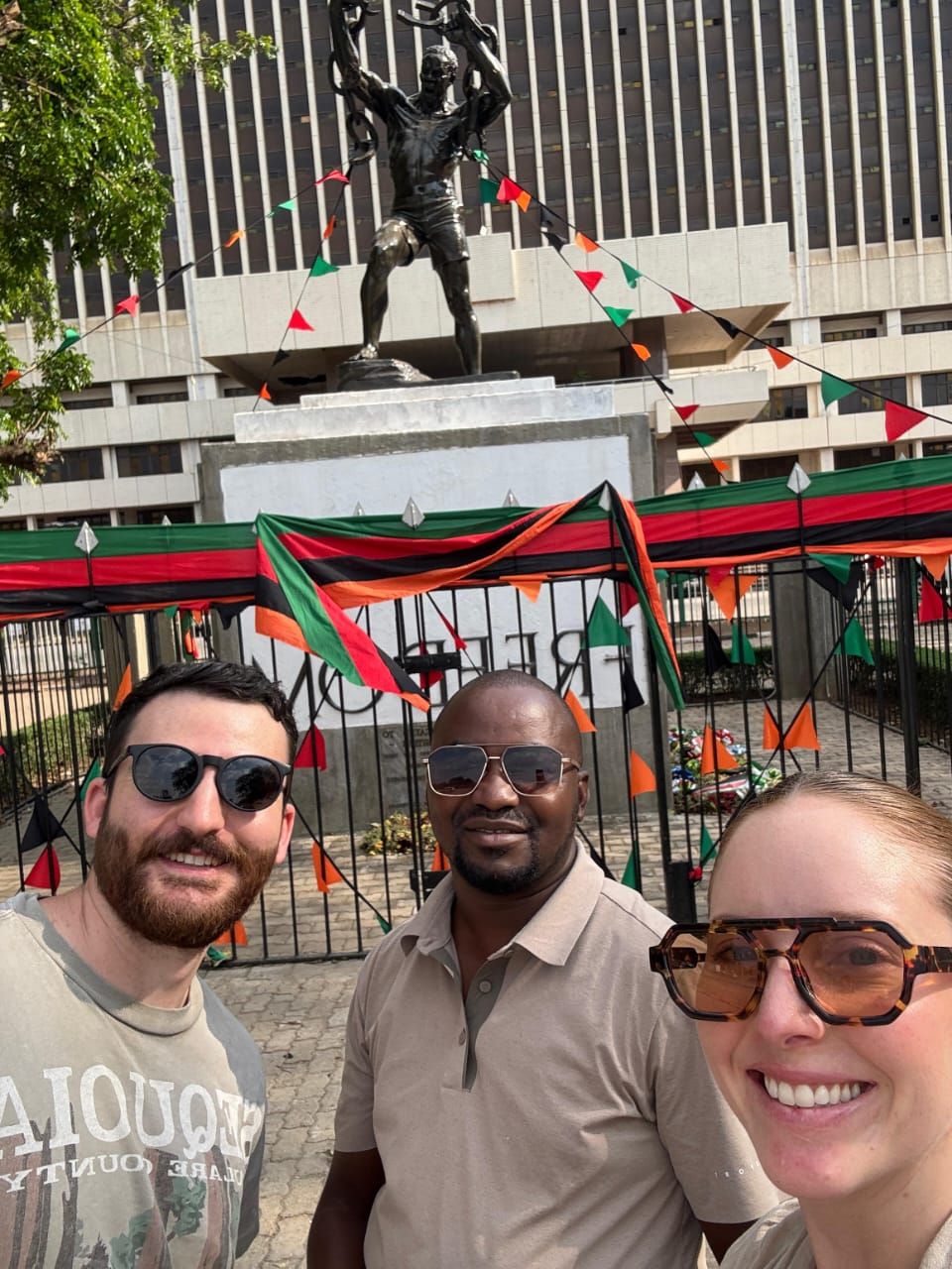 Guests at the Freedom Statue with their guide