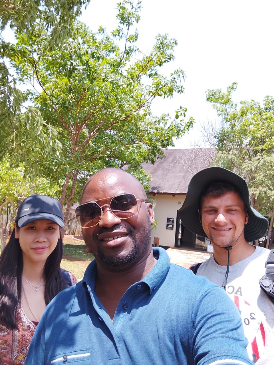 Petros with guests at a bush lodge
