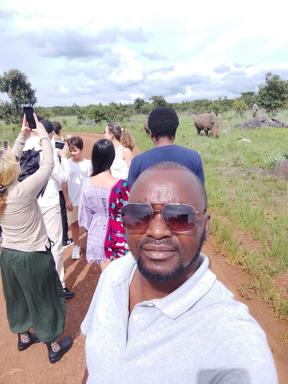 Petros with guests on a rhino walk
